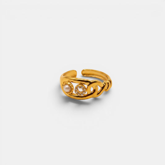 Edler Maris Ring aus Gold mit einem Gliederband und drei eingefassten, runden Schmucksteinen.